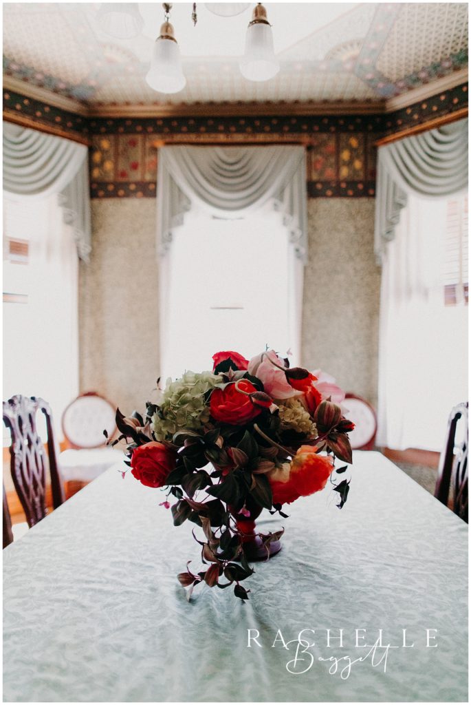 flowers on the table inside the A.C. Thomas house.