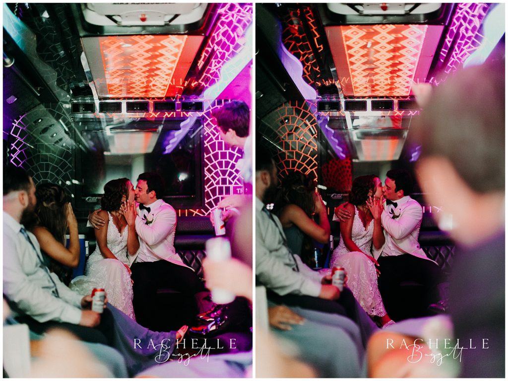 a bride and groom kiss on a party bus