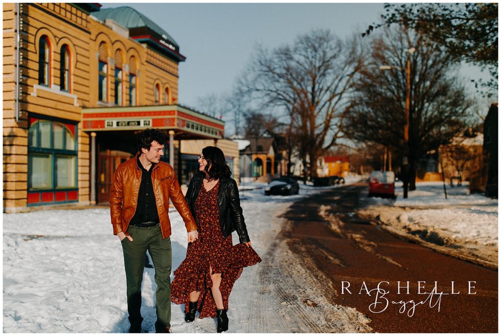 husband and wife walk downtown during their dreamy anniversary session
