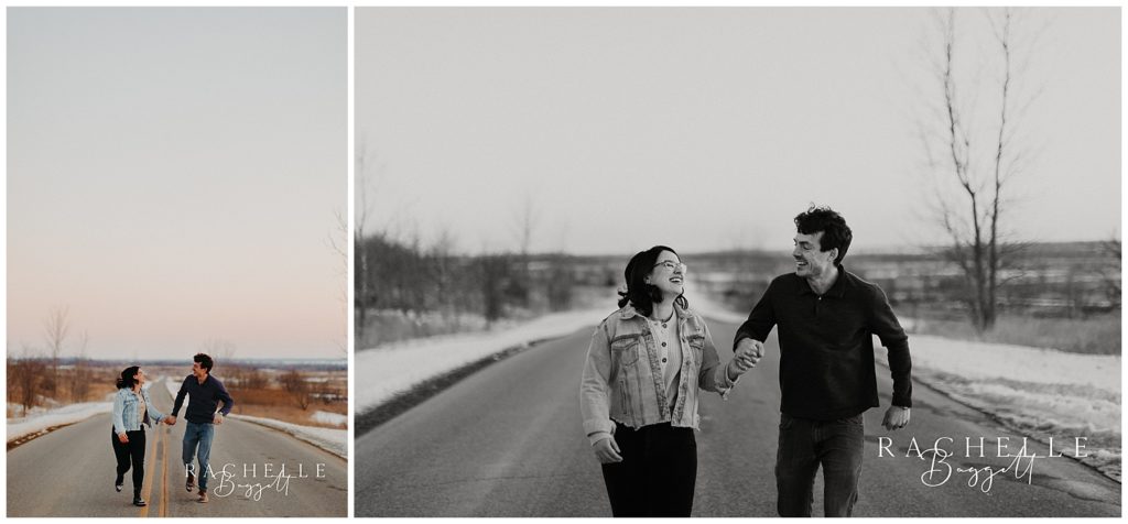 husband and wife walk down a snowy road during their dreamy anniversary session
