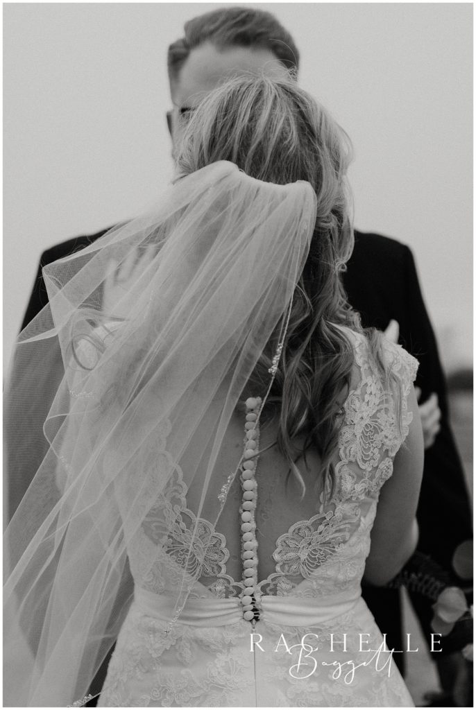 back of brides dress - detail photo