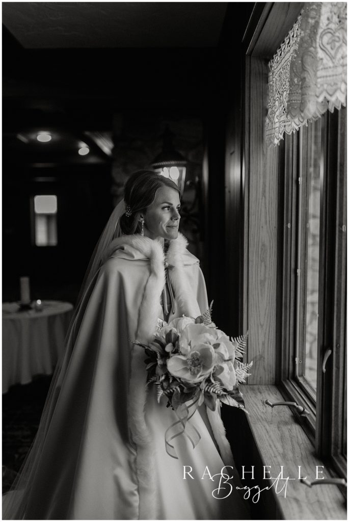 bride gazes out the window