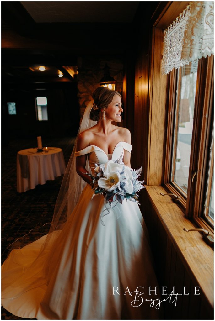 bride looks out window
