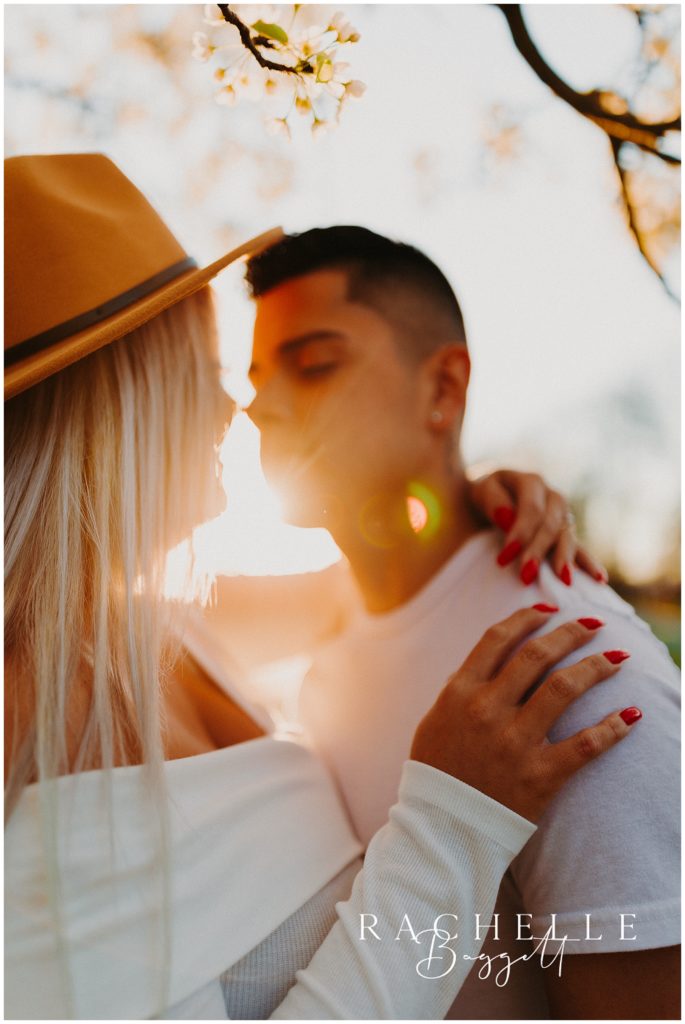 sunset kiss during engagement session