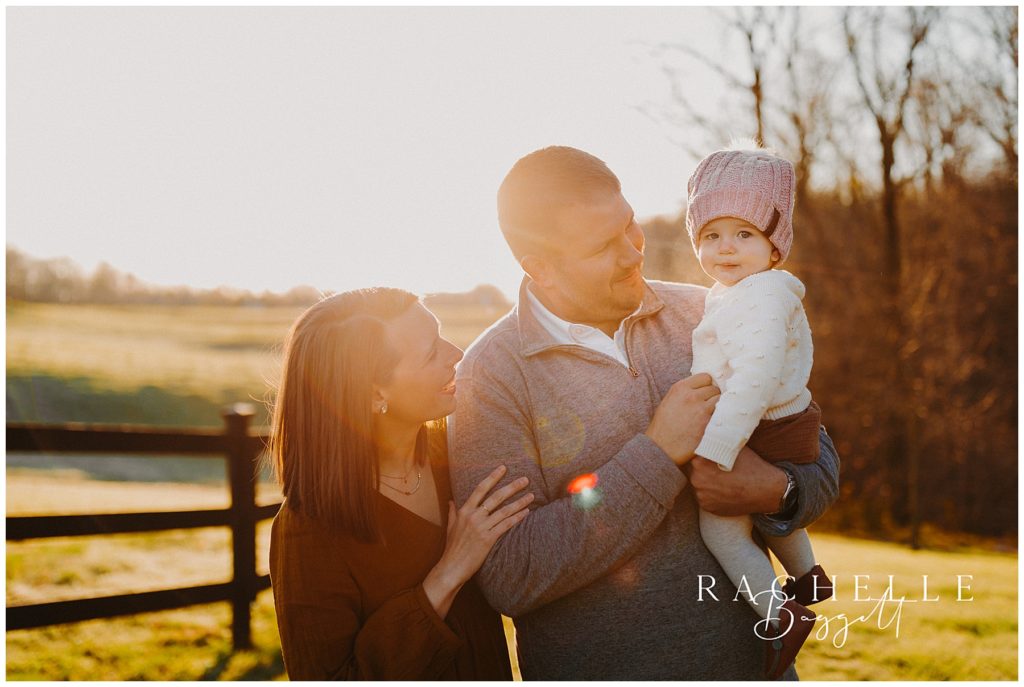 dad holds daughter during Sunrise Family Session
