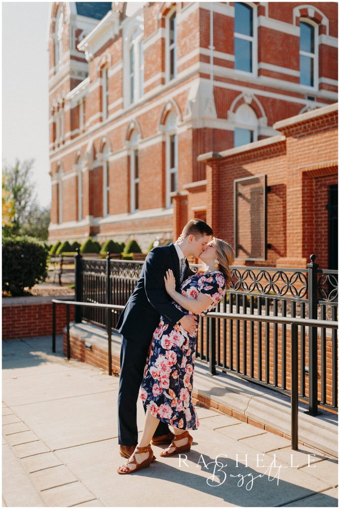 couple kissing outside during intimate Willard Library Engagement Session