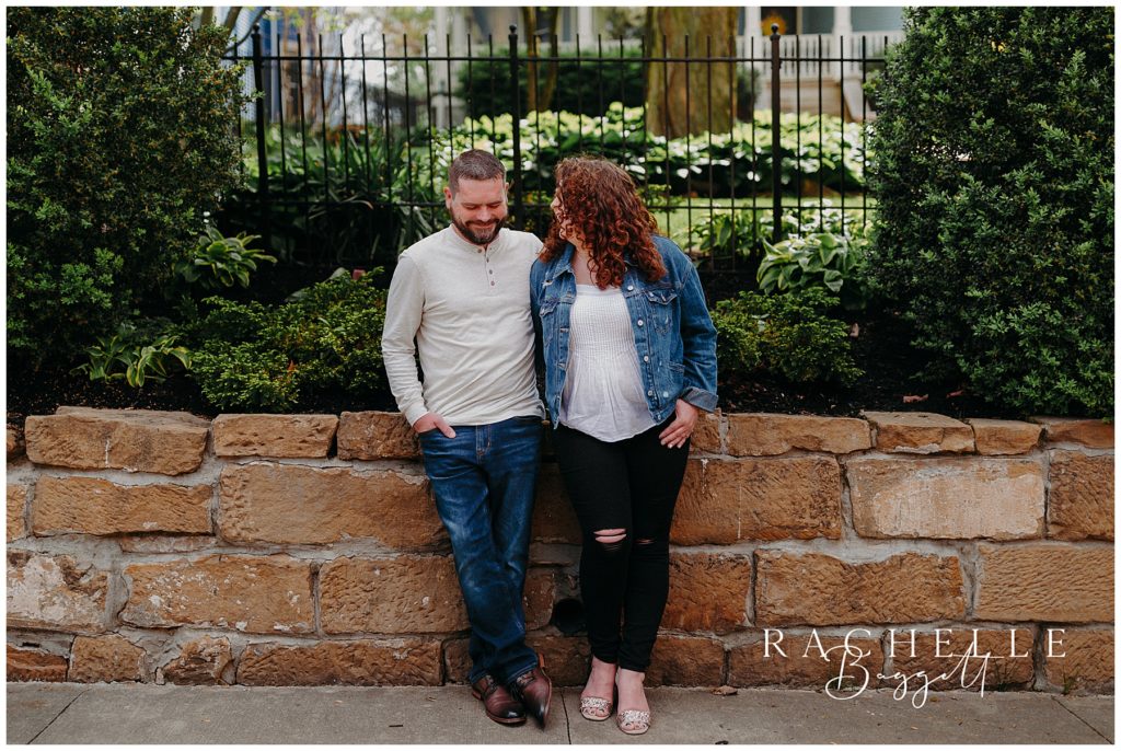 couple laughing together outside during small town mini session