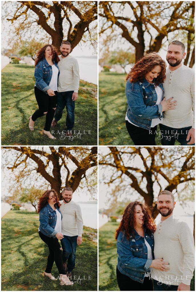 man and woman smiling and laughing together by the river during small town mini session