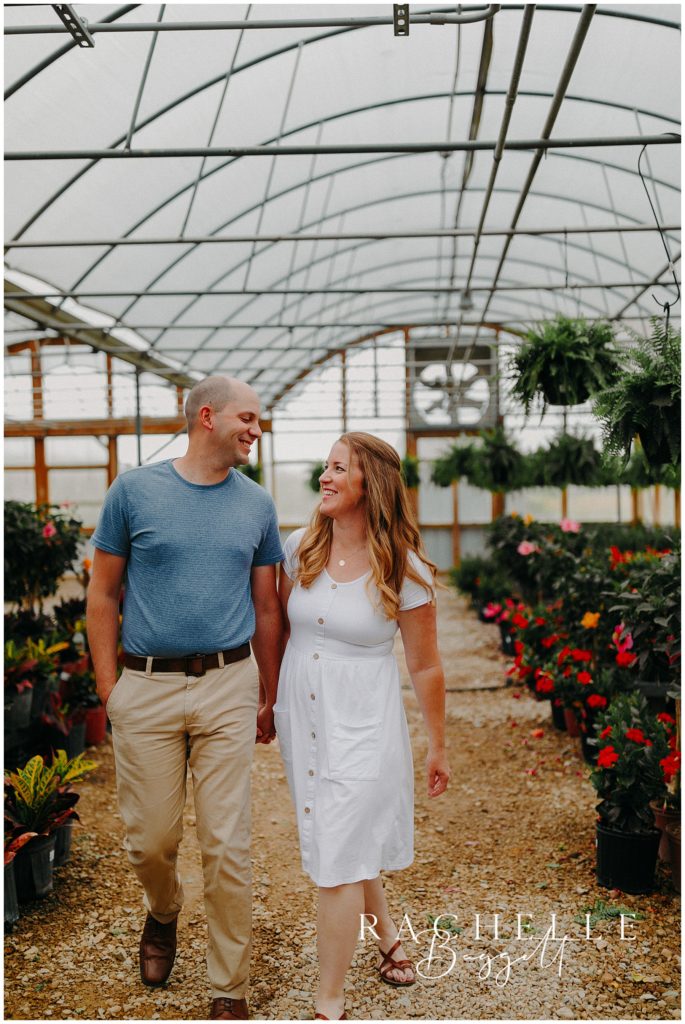 husband and wife walking together in greenhouse during Jonkers Family Mini