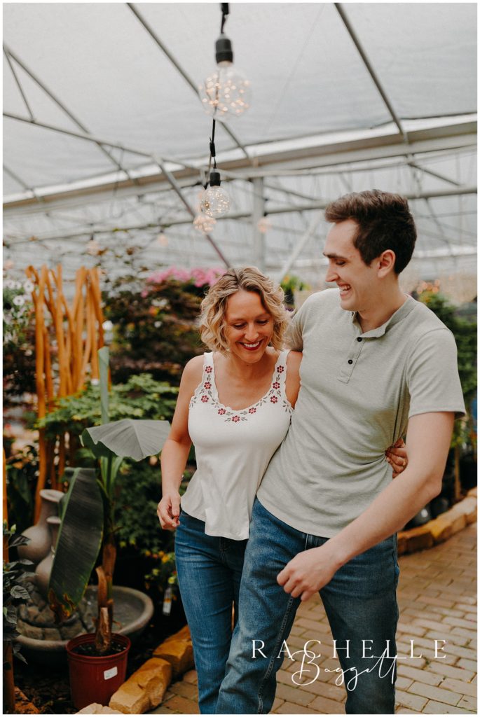 man and woman having fun together at Colonial Classics Greenhouse