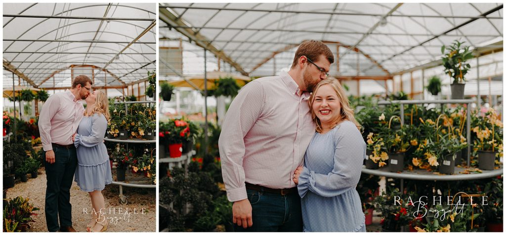 husband and wife kiss in greenhouse